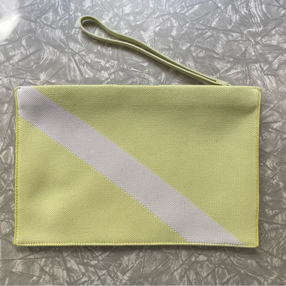 Rothy’s | The Essential Pouch in light lime (essential pouch/wristlet)